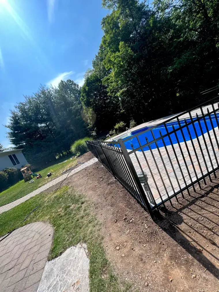 Aluminum Fence Above a Pool Terrace