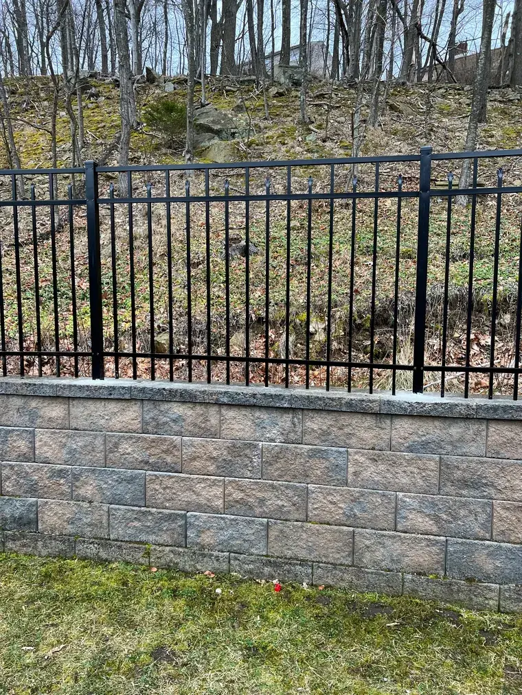 Aluminum Fence on a Woodland Boundary