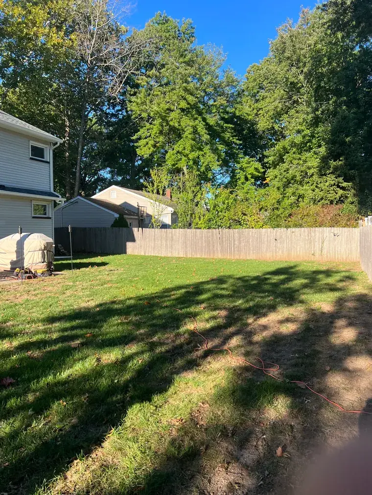 Vinyl Privacy Fence on a Sloped Lawn